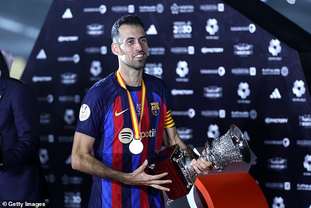 Sergio Busquets takes the 31st trophy that he has won in his time at Barcelona