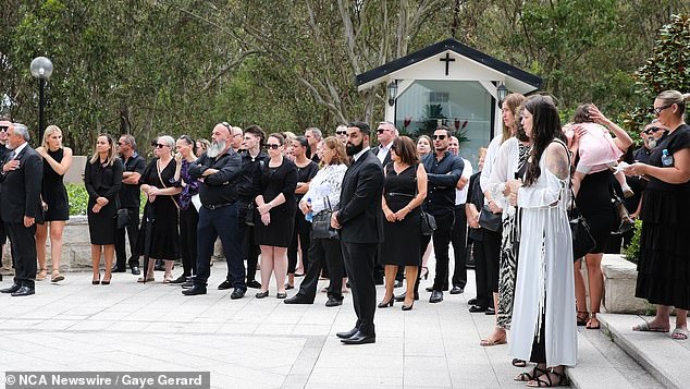 Family and friends (pictured) gathered to remember the devoted mother