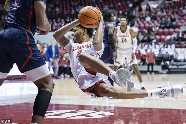 Miles falls to the ground during a recent Alabama game, against Jackson State in December