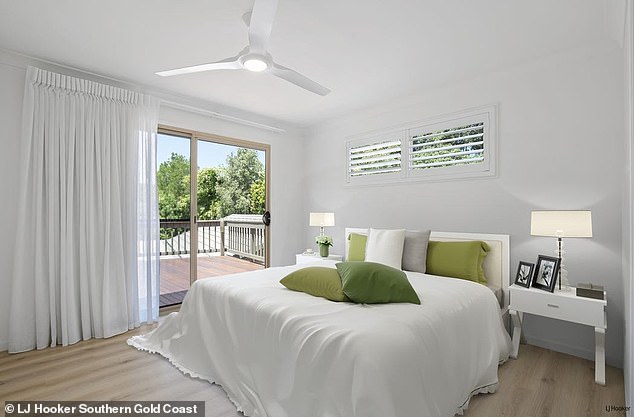 A second driveway also leads to a self contained two bedroom garden apartment.  (In the photo: one of the bedrooms in the main house)