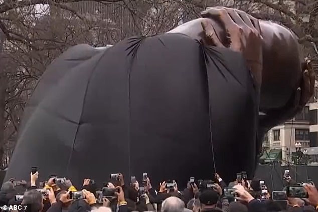 Boston residents gathered to witness the unveiling of the $9.5 million sculpture.