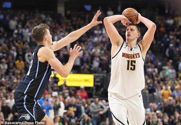 Nuggets' Nikola Jokic fires a game-winning 3-pointer over Orlando Magic forward Franz Wagner