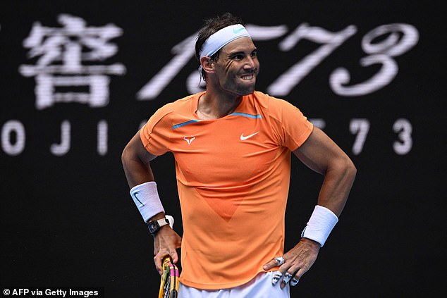 Nadal reacts after a point against Britain's Jack Draper during their men's singles match on day one of the Australian Open tennis tournament in Melbourne.