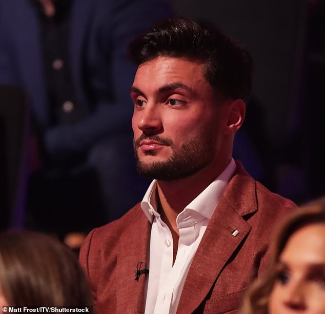 NSFW: When asked by host Holly Willoughby 'How hot is your girlfriend?'  the Italian hunk, 27, replied: 'I know, I can't wait to bring her home' (Davide watching from the audience)