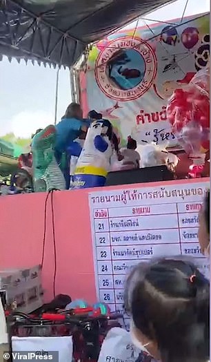 Children and adults attended a large National Children's Day event in eastern Thailand.