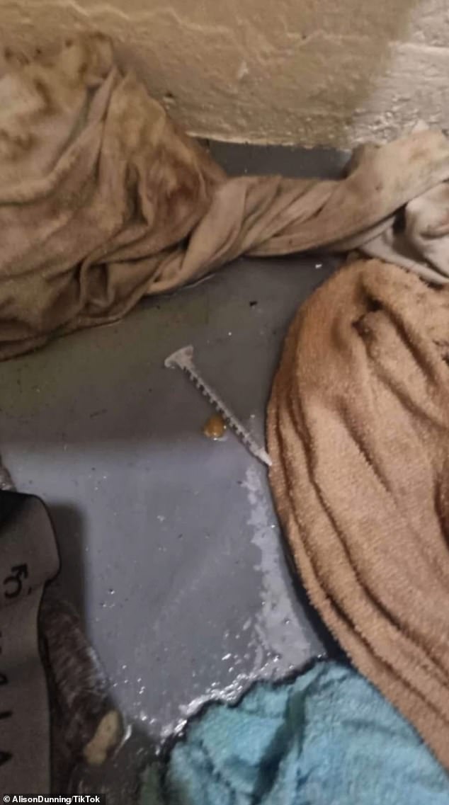 A syringe was found on the bathroom floor strewn with underwear and towels.