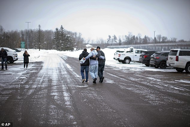 Rhodes is the first person released in Minnesota since the Conviction Review Unit was created in 2021 (pictured hugging her children after her release)