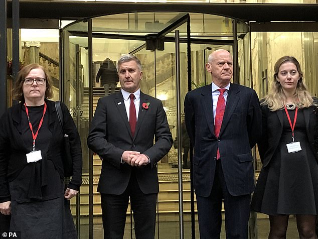 Freeman (center left, pictured with his defense team off the court in 2019) faces a minimum four-year ban and could be banned from playing the sport for life.