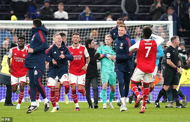 A melee then broke out before the Gunners peeled off to celebrate in front of the traveling fans.