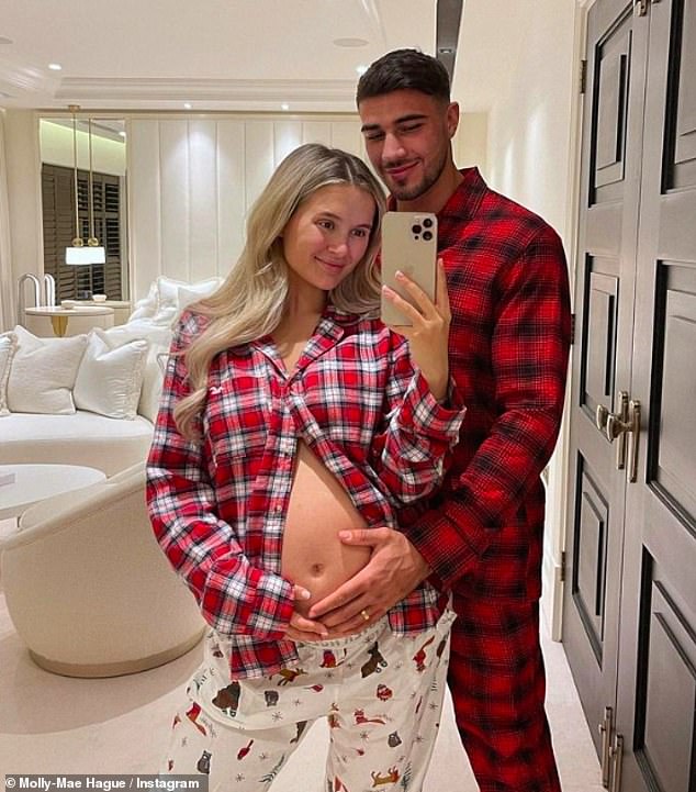 Cute couple: The Love Island star is due to welcome her first child with Tommy Fury any day now and has had to avoid having any dental work during her pregnancy