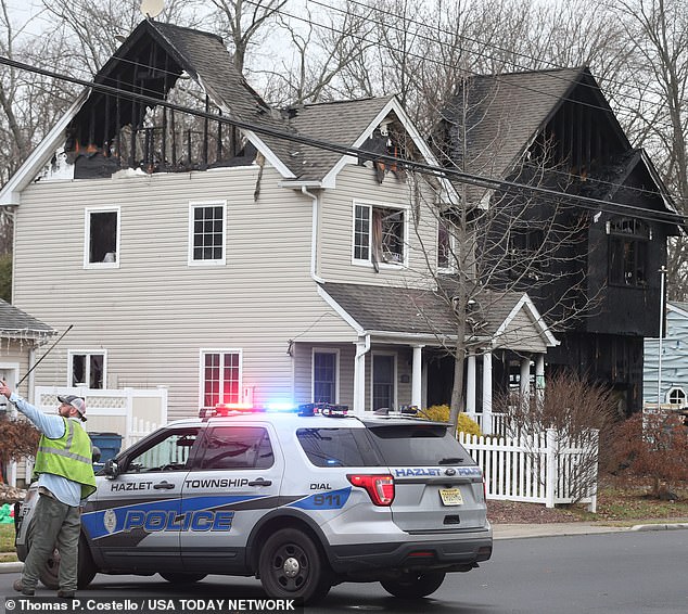 Officers were seen at the scene located at 10 Brookside Avenue on Friday.  The left side of the sofa appears to be almost intact from the outside.