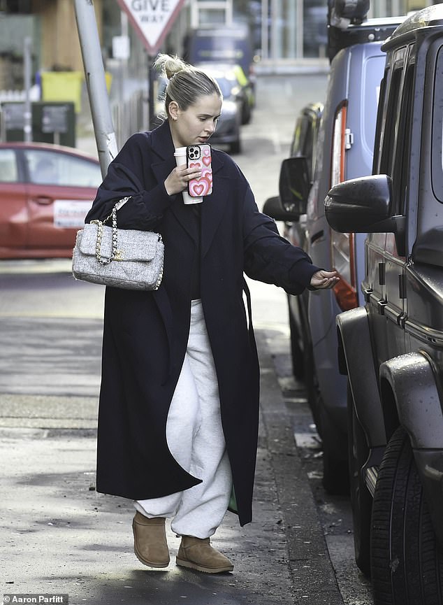 Relaxed look: The Love Island star, who recently detailed her body insecurities in her latest YouTube video, bundled up on a cold winter day