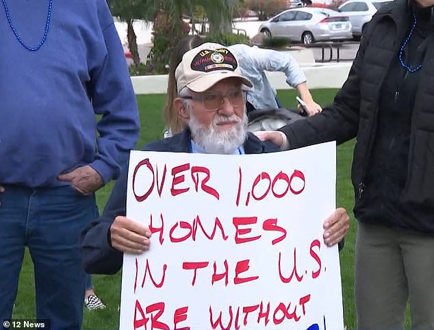 Protesters gather outside Scottsdale City Hall after the water supply was shut off in January.