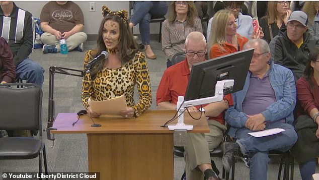 The mother of three previously dressed as a cat at a school board meeting to protest the 