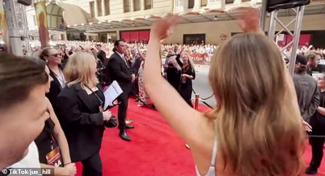 As the Wolf Of Wall Street star chatted with reporter Justin Hill, one of her friends yelled 'hey Maggot', her embarrassing school nickname, behind her.  The blonde beauty took to the dig with a brisk pace, turning to greet them enthusiastically.