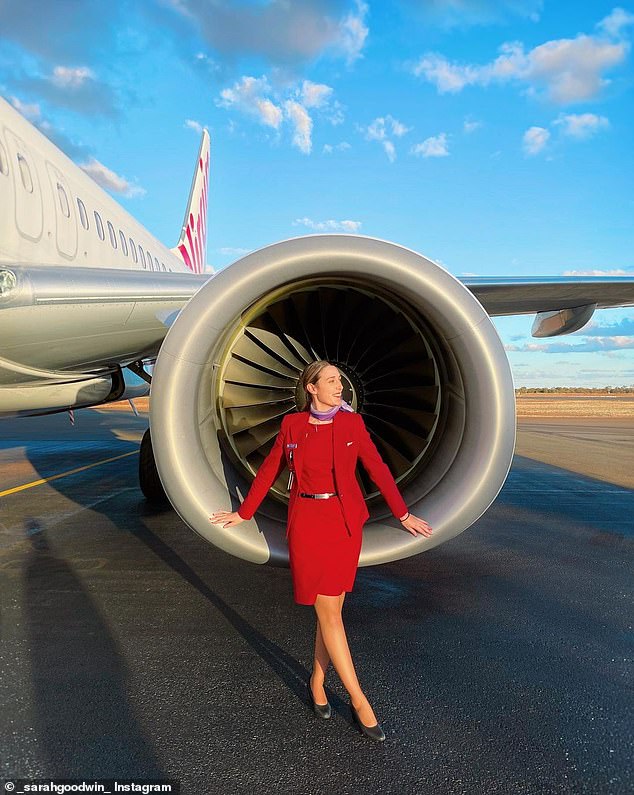 Sarah has created a TikTok after sharing a glimpse into her glamorous life as a flight attendant (pictured);  she revealed that she uses a whole can of hairspray to fix her hair