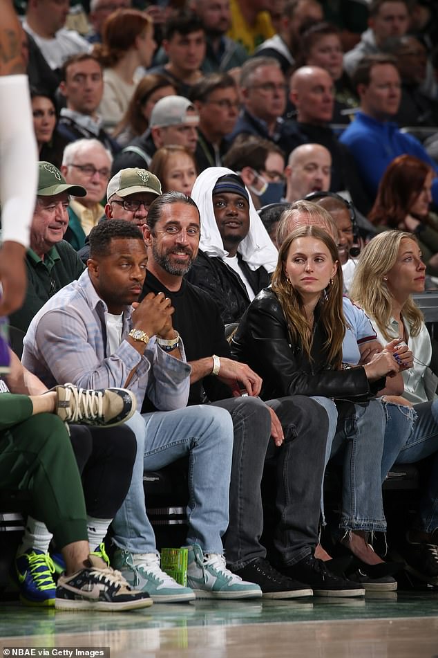 Getting closer: The 39-year-old Green Bay Packers star is reportedly getting close to 26-year-old Mallory Edens, a source told People (Rodgers, cetner, Edens, right)