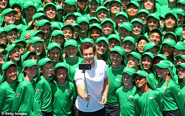 Most of the youngsters who do the demanding work are tennis fanatics and happy to work close to their sporting heroes (Andy Murray was photographed taking a selfie with a ball boy in 2016).