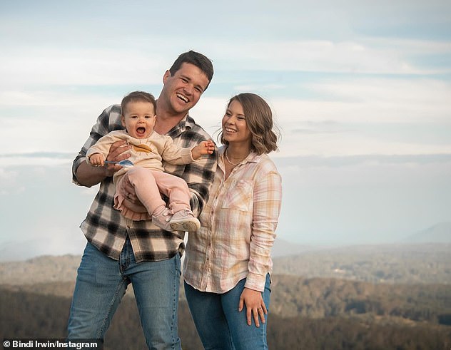 Bindi and Chandler (left) are also reportedly planning to keep their second child out of the spotlight, unlike Grace, two (center), who appears regularly on the Wildlife Warriors social media page.