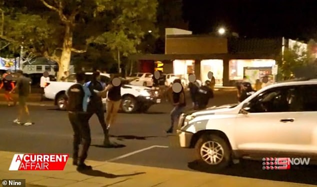 Youths are seen terrorizing the streets of Alice Springs as locals call for help in dealing with the crime wave.