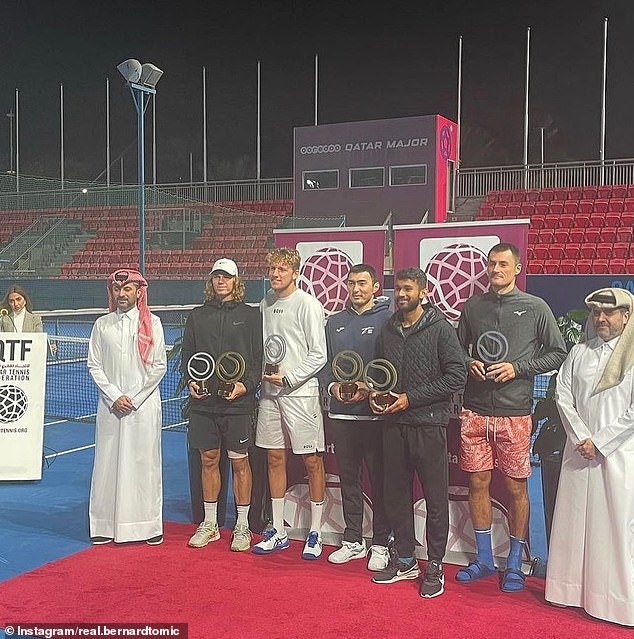 The winners and runners-up, including Tomic, take to the pitch in Doha, Qatar, with no one in the stands to cheer them on.