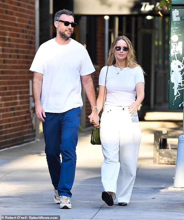 Happy couple: Jennifer married art gallery director Cooke Maroney in 2019, after the two lovebirds began dating in 2018;  the couple seen in August 2022 in New York