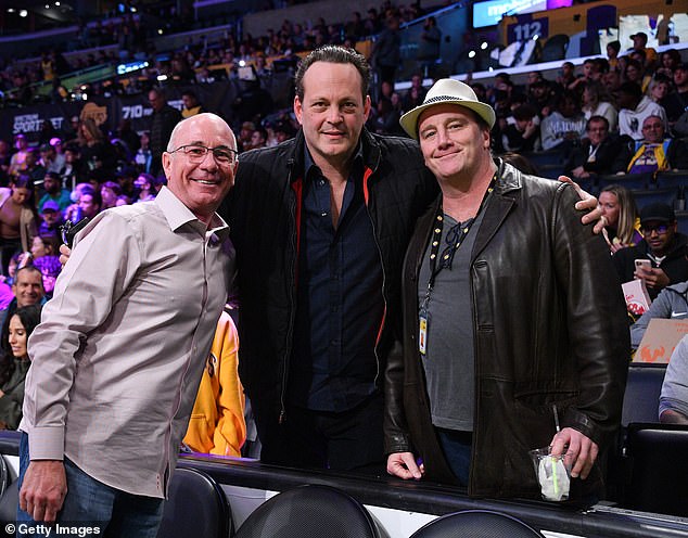 Group photo: Jay also posed with basketball coach and broadcaster Dave Miller and actor Vince Vaughn, 52, at the game.