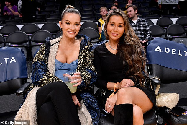 Courtside Seating: The Christmas game was also attended by actresses Caitlin O'Connor and Kathryn Le, who were seen sitting courtside.