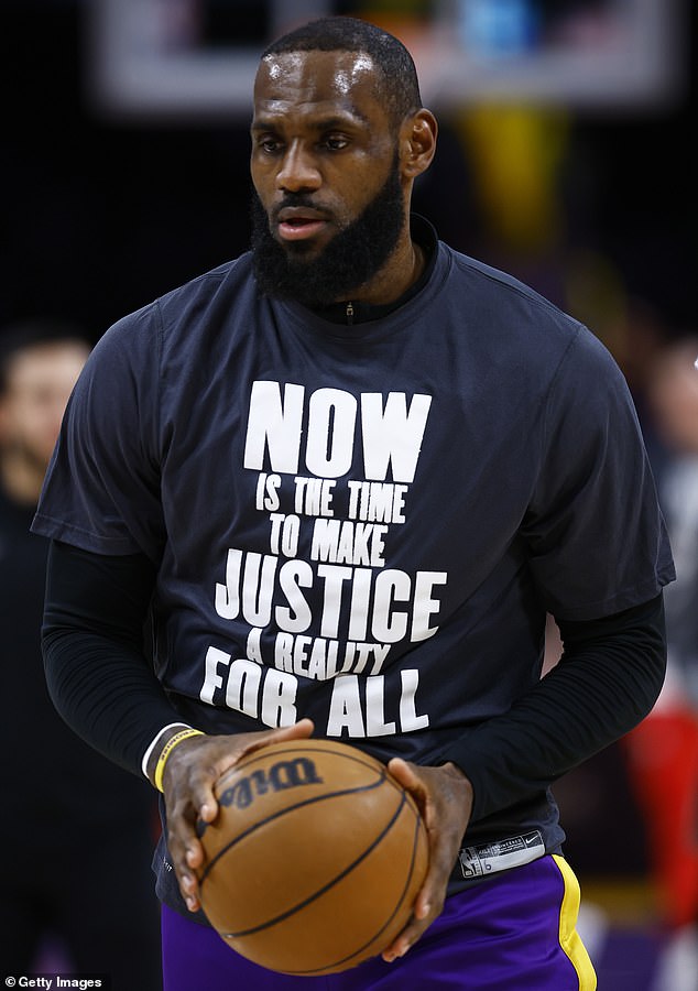 To all: LeBron before the MLK Day game warmed up in a black with white print t-shirt that read: 'NOW IS THE TIME TO MAKE JUSTICE A REALITY FOR ALL'