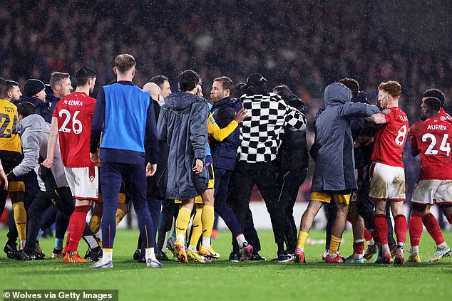 Stewards and staff members were forced to intervene when players from both sides clashed.