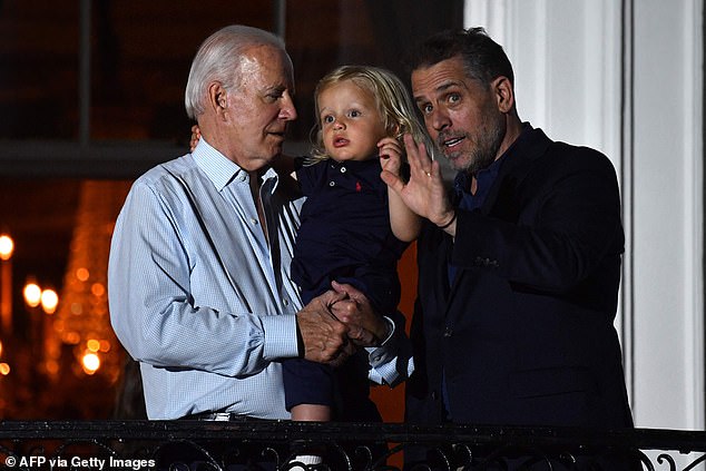 The first son's laptop contained lewd photos documenting his drug-fuelled binges, details of his shady international business dealings, and emails in which Hunter appeared to be selling access to his father, then vice president.  Above are Joe Biden, Beau Biden, Hunter's son, and Hunter on July 4, 2022.