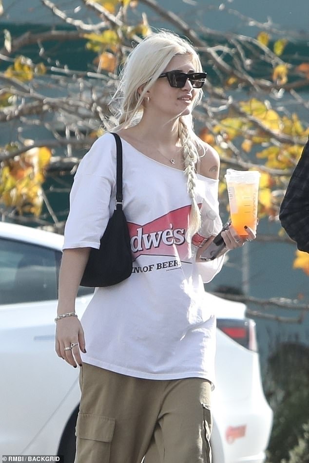 T-shirt: Charlie Sheen's 18-year-old daughter donned a white T-shirt with a Budweiser symbol on the chest.