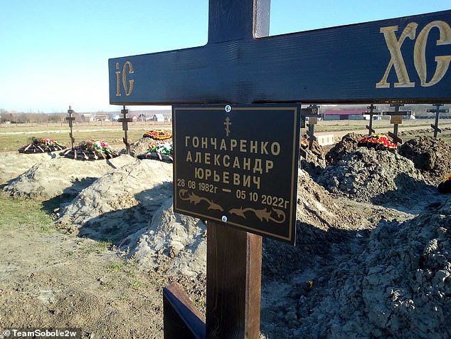 In the picture: a cross with the name of Goncharenko Alexander Yurievich is seen at the Wagner cemetery.  The dates show that he died shortly before his 40th birthday.