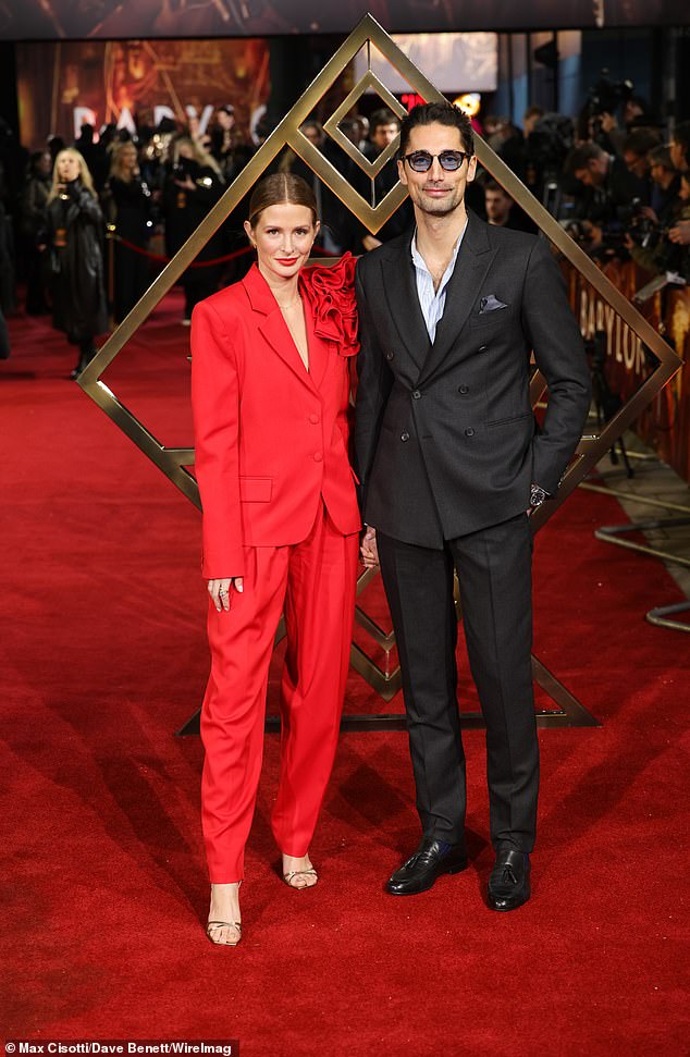 Beloveds: Your holidays come after Millie snuggled up with husband Hugo on the red carpet at the Babylon premiere on Thursday night.