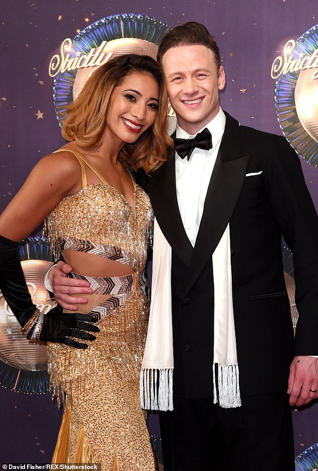 Split: Kevin was previously married to Strictly pro dancer Karen Hauer, whom he split after three years of marriage and a year before he met Stacey (pictured in August 2017)