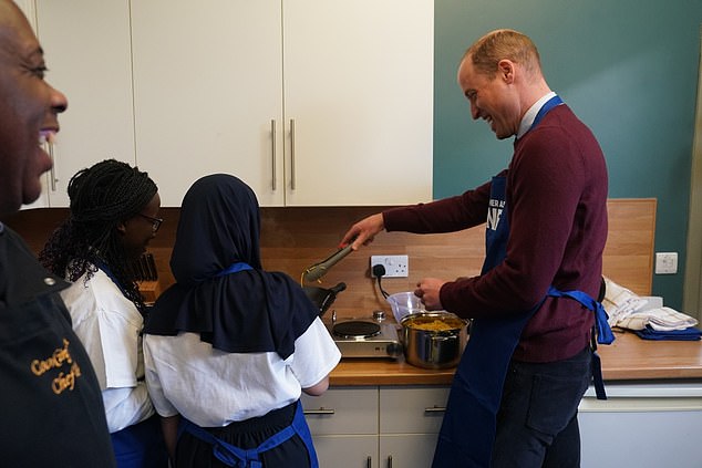 Prince William beamed as he served the teriyaki chicken he had prepared with the young caretakers who rely on the charity.