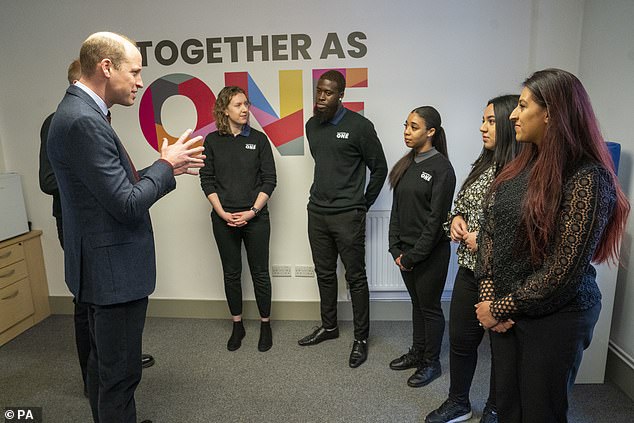 Prince William visited the center ahead of his 25th birthday next month.  The Prince of Wales pictured speaking to staff and volunteers in Slough