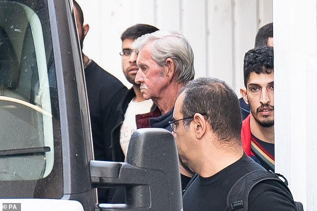 British pensioner David Hunter is escorted into a custody van at Paphos Assize Court in December