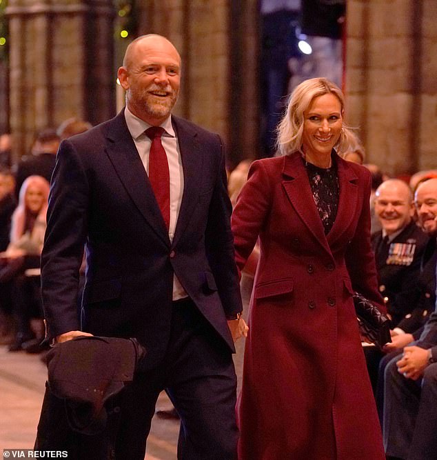 Mike and Zara Tindall (pictured) also wore sparkling burgundy when they arrived at Westminster Abbey for the Christmas carol service.