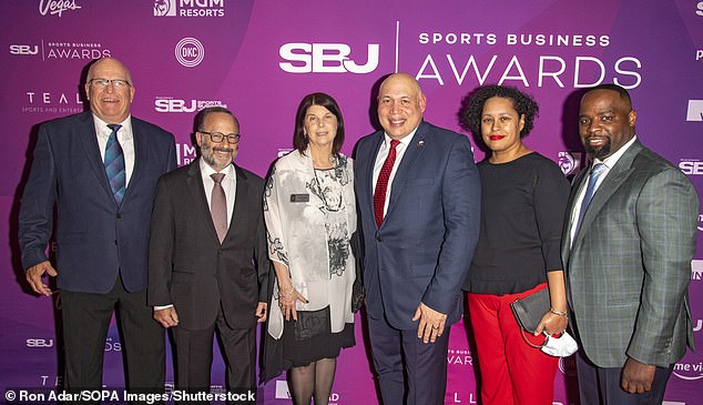 Pictured: Northern Illinois University President Lisa C. Freeman (center) and colleagues