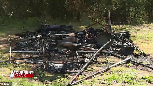 The burnt out remains of Russell Hill and Carol Clay's camp in the Victorian Alps