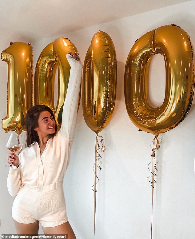 Emily celebrated reaching 10,000 followers on her social media account with balloons and a glass of wine.