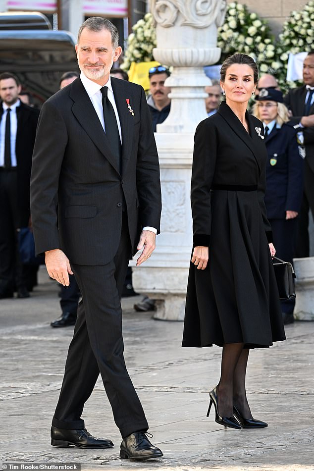 King Felipe and Queen Letizia greeted the mourning family of King Constantine II yesterday before heading inside the church for the funeral.