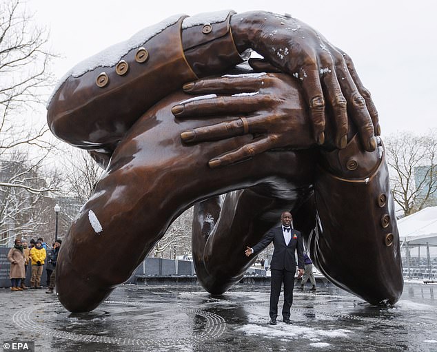 'The Embrace' in Boston.  The statue was recently unveiled as a tribute to Martin Luther King Jr. and is meant to celebrate an image of MLK and his wife Coretta Scott King.