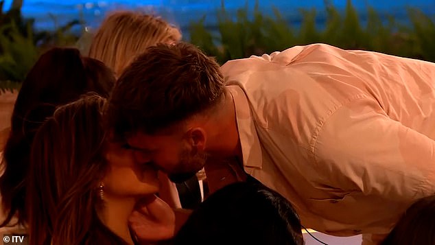 The frown: After Tom stormed into the villa during Monday's cliffhanger finale, he was able to lock lips with three girls of his choice on Tuesday's Love Island (pictured with Tanyel)