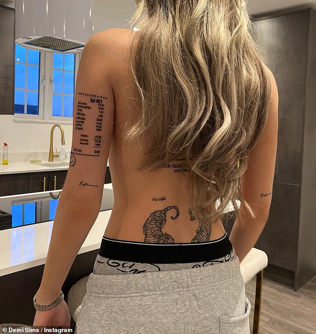 'It means a lot to me': Former TOWIE star, 26, revealed her new tattoo while posing topless on Instagram is 'an actual copy of a restaurant receipt on a special day'