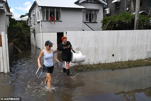 Despite wet weather and severe storm warnings, temperatures are forecast to be hot and sweaty as warm air descends from the inland before a cold front approaches out to sea.