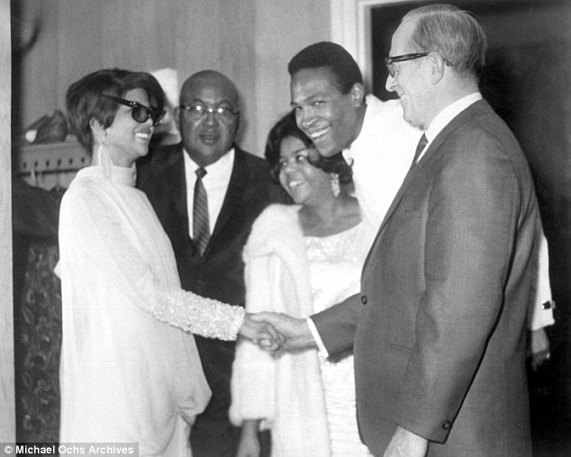 Happy Times: Gaye III is the adopted son of legendary singer Marvin Gaye and his wife Anna Gordy Gaye;  the couple were married between 1963 and 1977 (pictured, Anna, center, and Gaye, second from right, are shown here around 1970)