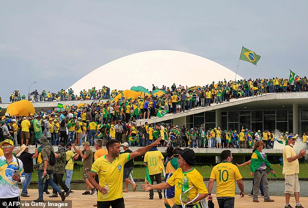 Supporters of former Brazilian President Jair Bolsonaro invade the National Congress in Brasilia on January 8, 2023