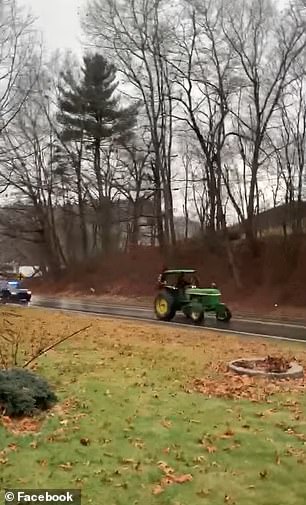 Another video showing Hicks being chased on the tractor is filmed on a wooded road, the posts caption reads: 